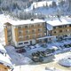 Hotelansicht im Winter Almhotel Kärnten - Restaurant-impression #7
